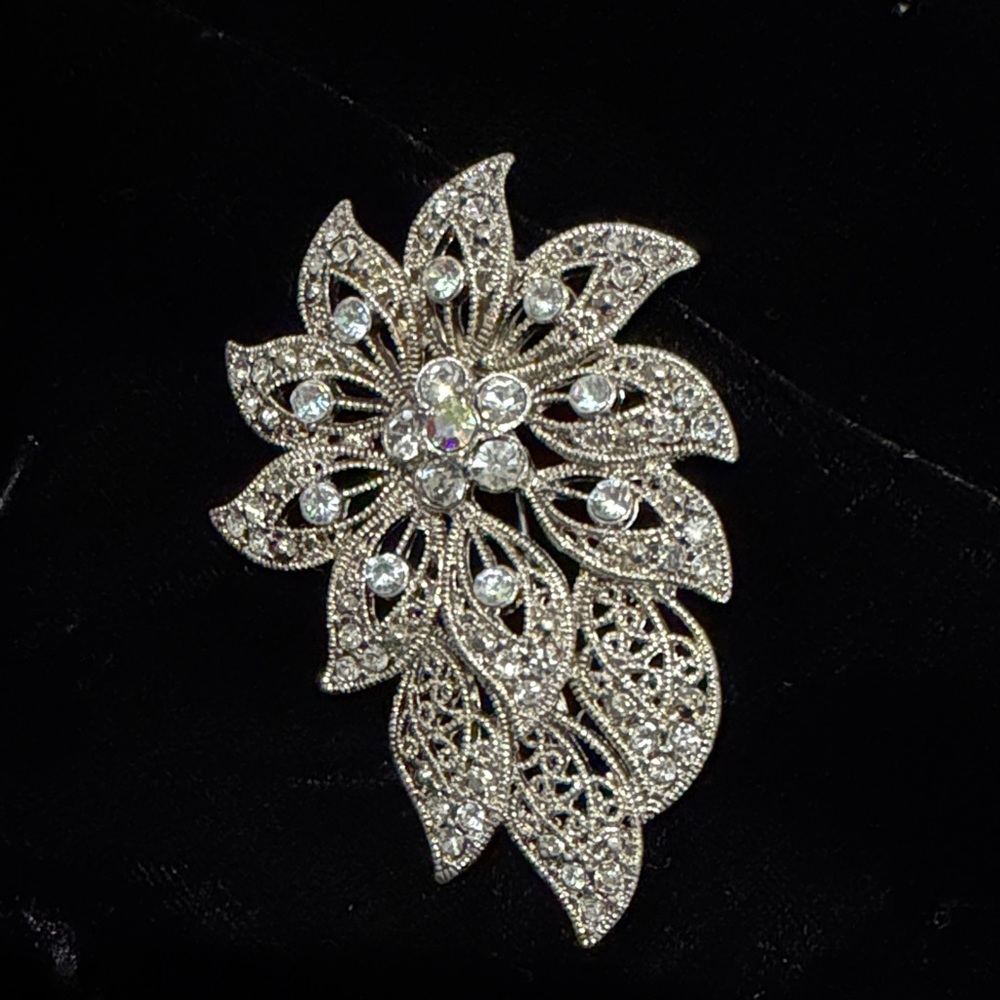 Silver Art Nouveau flower brooch by Liz Claiborne.